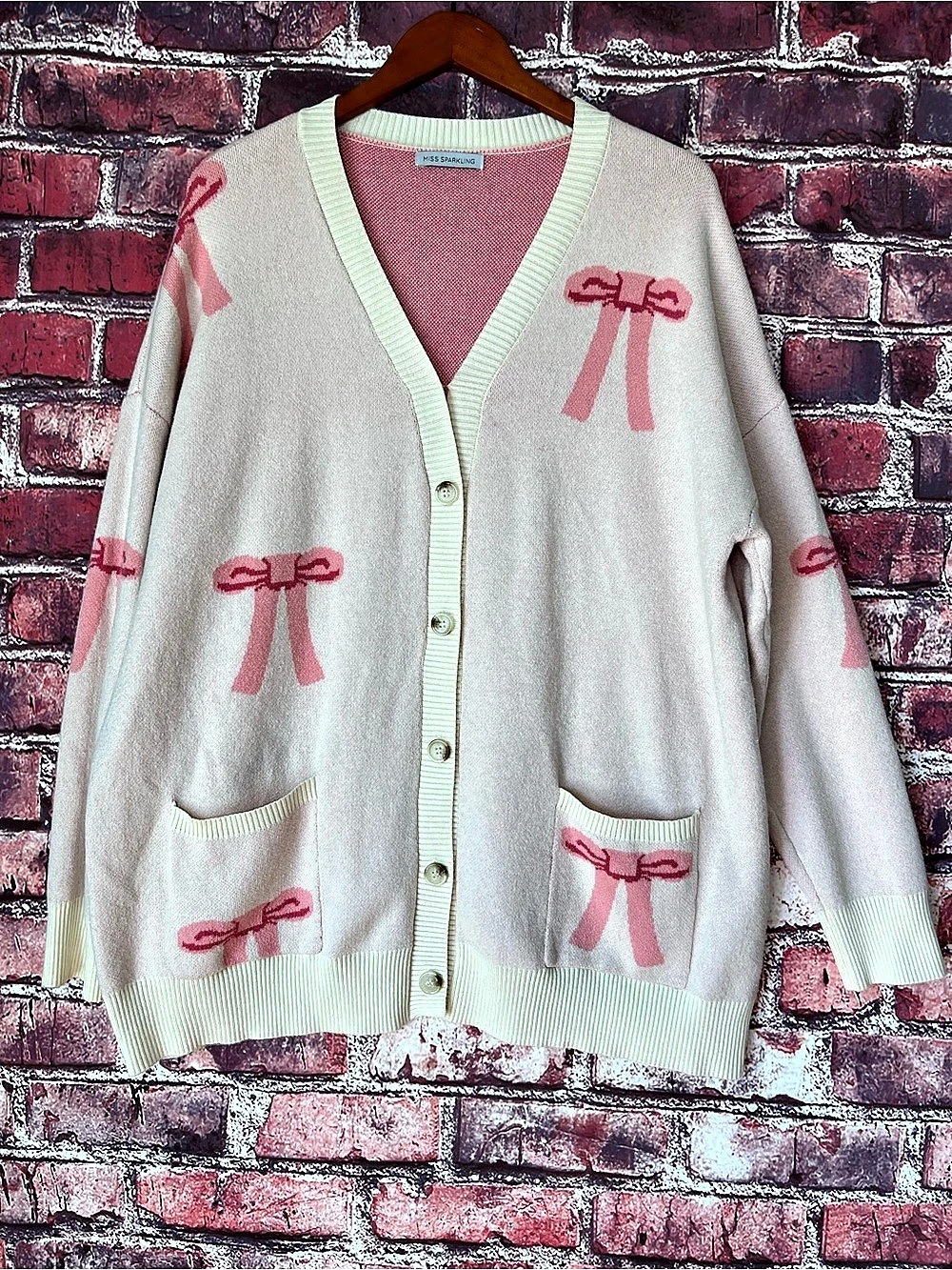 Miss Sparkling All Over Bow Knit Cardigan Pink Cream Size Large